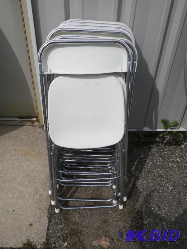 10 white plastic folding chairs with chrome f...