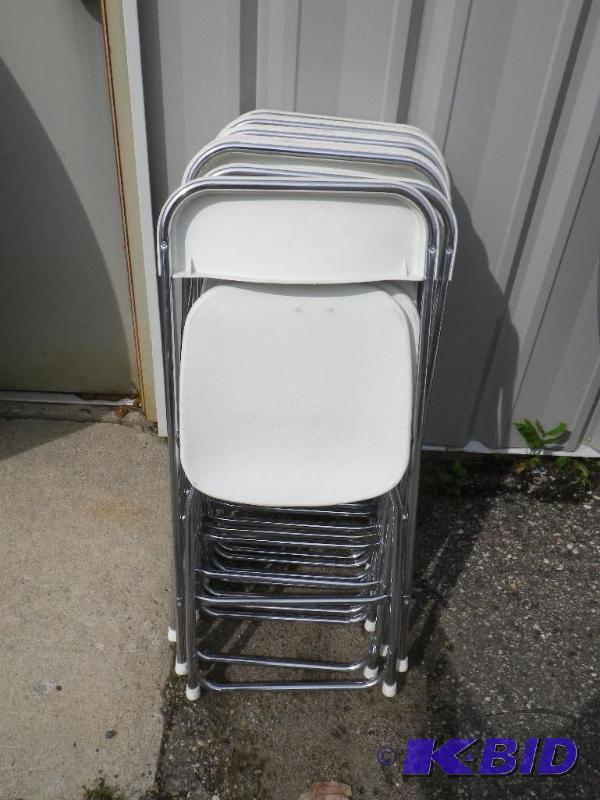 10 white plastic folding chairs with chrome f...