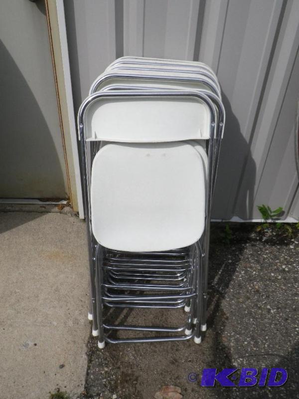 10 white plastic folding chairs with chrome f...