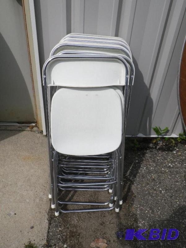 10 white plastic folding chairs with chrome f...
