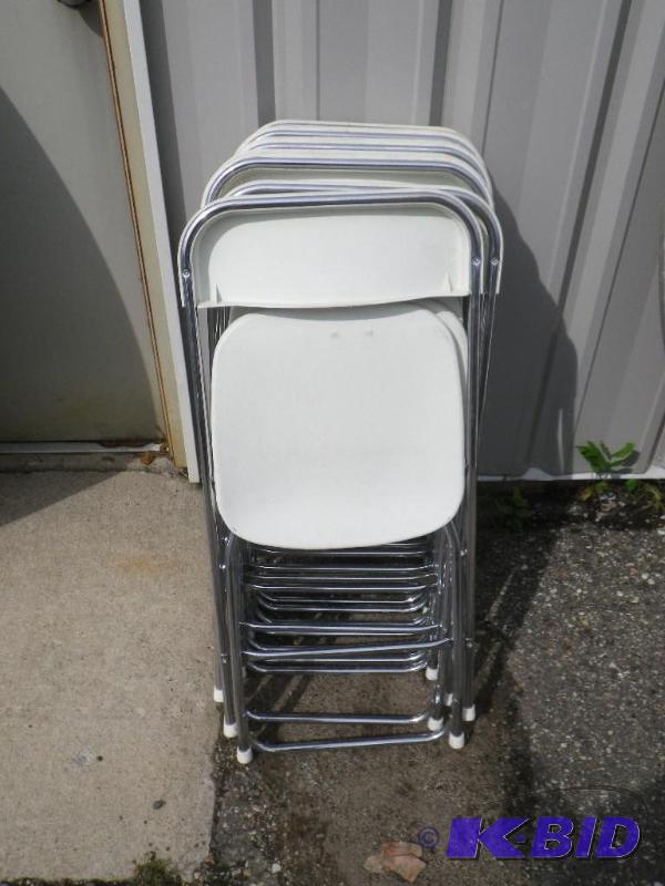 10 white plastic folding chairs with chrome f...