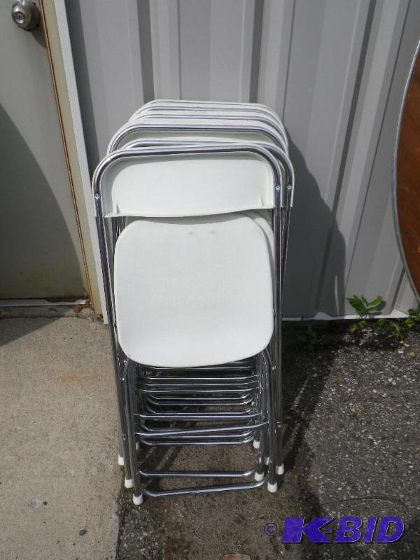 10 white plastic folding chairs with chrome f...