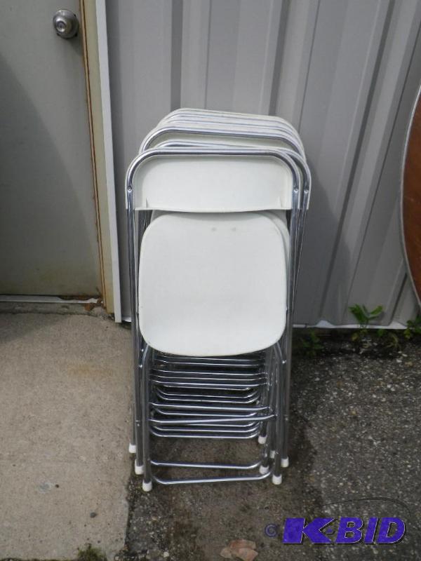 10 white plastic folding chairs with chrome f...