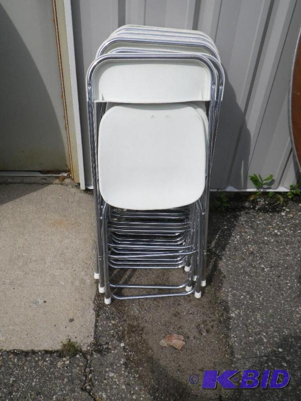 10 white plastic folding chairs with chrome f...