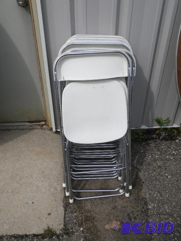15 white plastic folding chairs with chrome f...