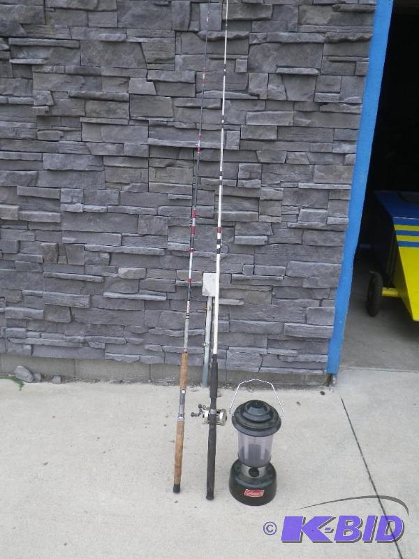 2 fishing poles and coleman lantern...