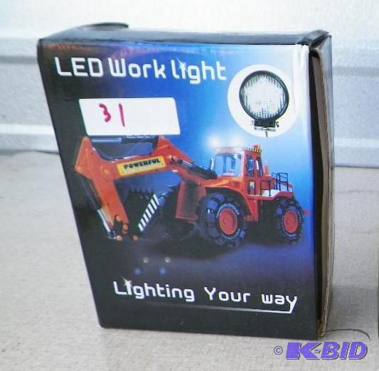 lot 31 image: LED Tractor Work Light with Mounting Hardware