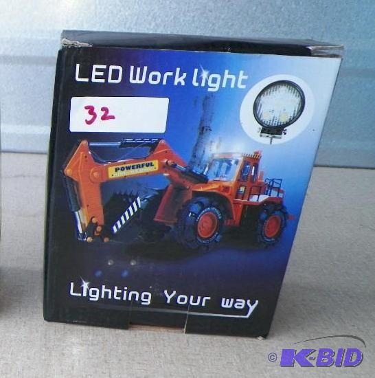 lot 32 image: LED Tractor Work Light with Mounting Hardware