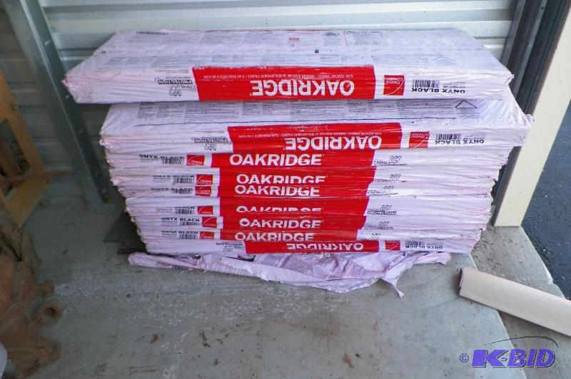 lot 38 image: 9 full bundles of shingles.