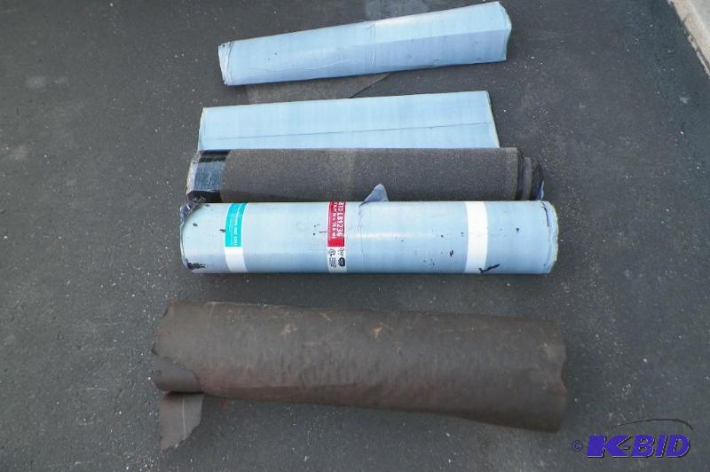 lot 39 image: 3 rolls of vapor barrier ( 1 full roll and 2 partial ) and 1 roll of plain tar paper