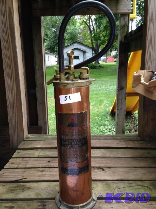 lot 51 image: Brass The Captain Fire Extinguisher