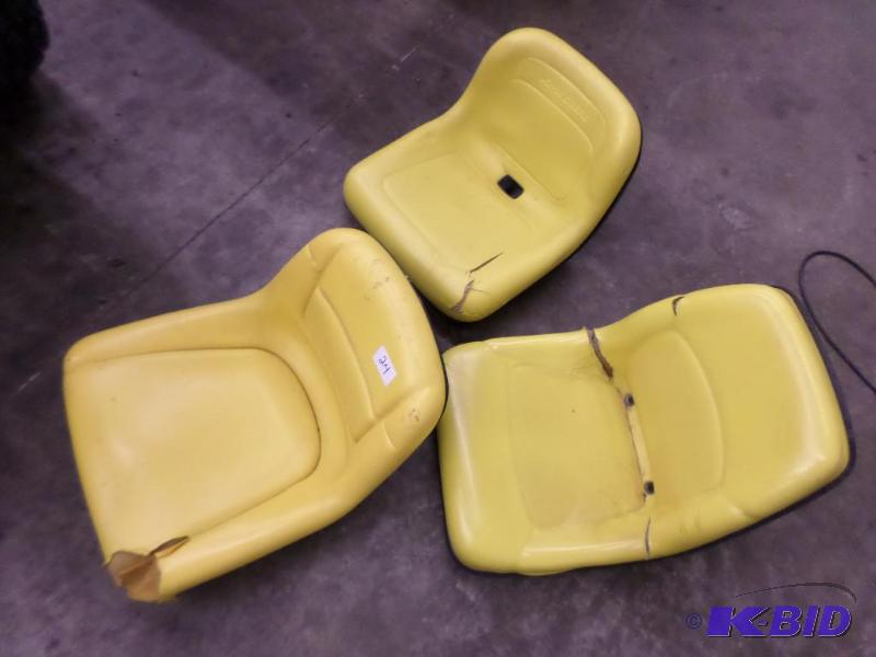 lot 24 image: (3) Used John Deere Tractor Seats...