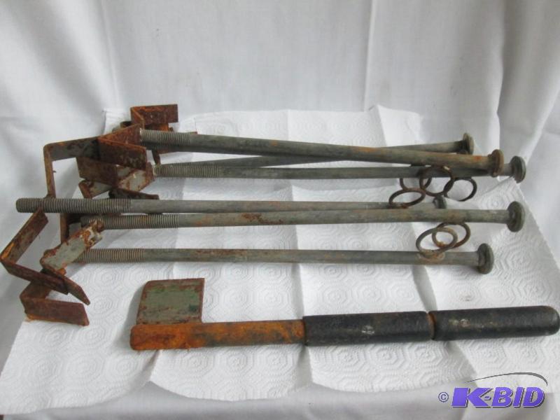 lot 17 image: Seven Snare Anchors and a Hatchet