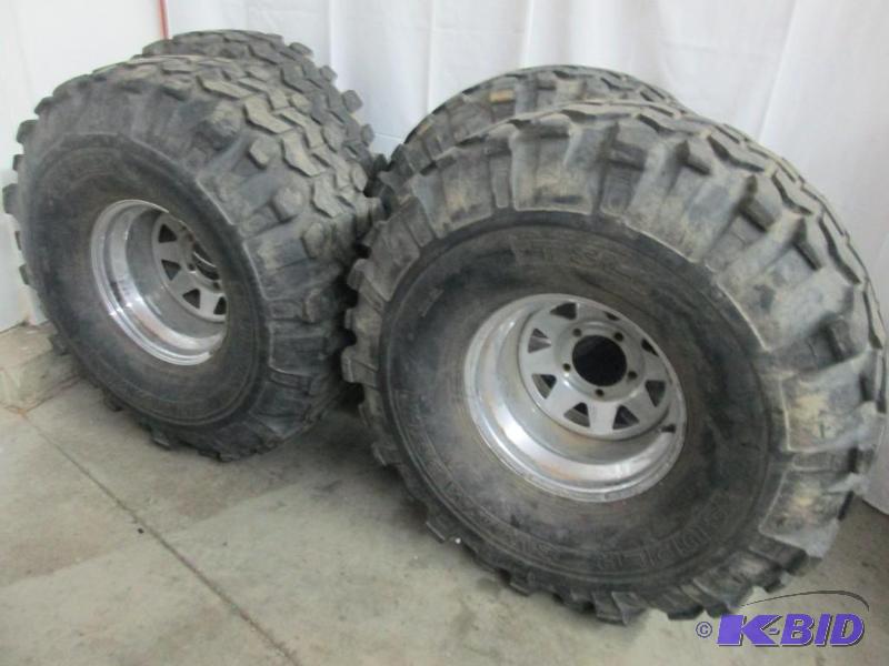 lot 3 image: 4 - 39.5 Super Swamper Tires and Rims