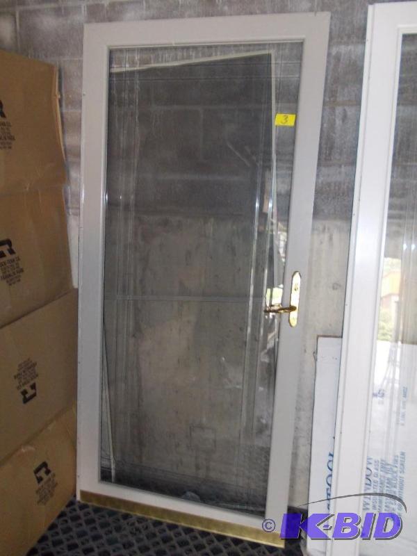 lot 3 image: Glass Storm Door & Screen 36x80...