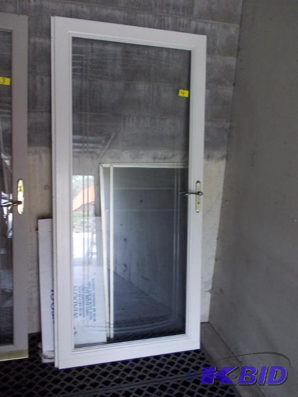 lot 4 image: Glass Storm Door Only (Other Assorted Window ...