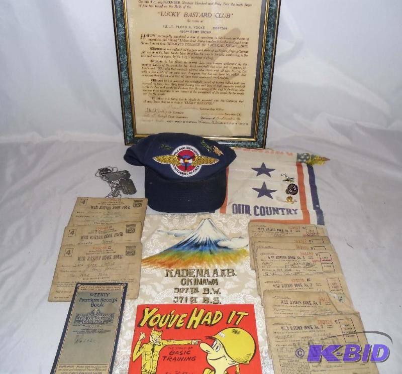 lot 20015 image: Lot World War II  493rd Bombers Lucky Bastards Club  Dog tags Food Ration Books