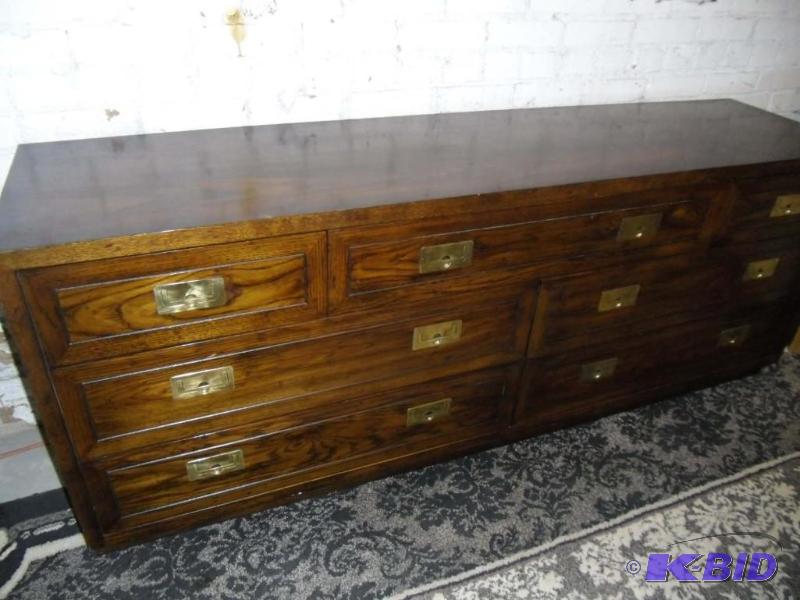lot 20040 image: Long Asian Style 7 Drawer Buffet  Side Board and Glass Brass Side Table