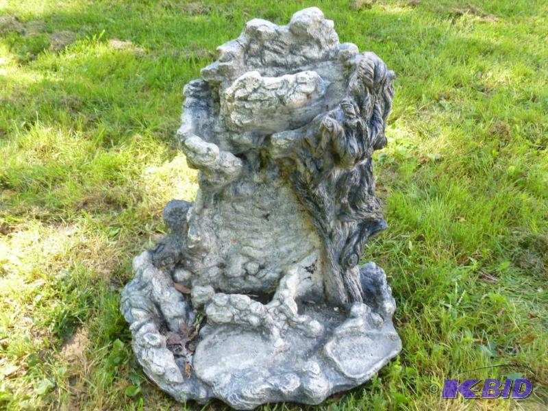 Large cement yard decoration that measures ab...