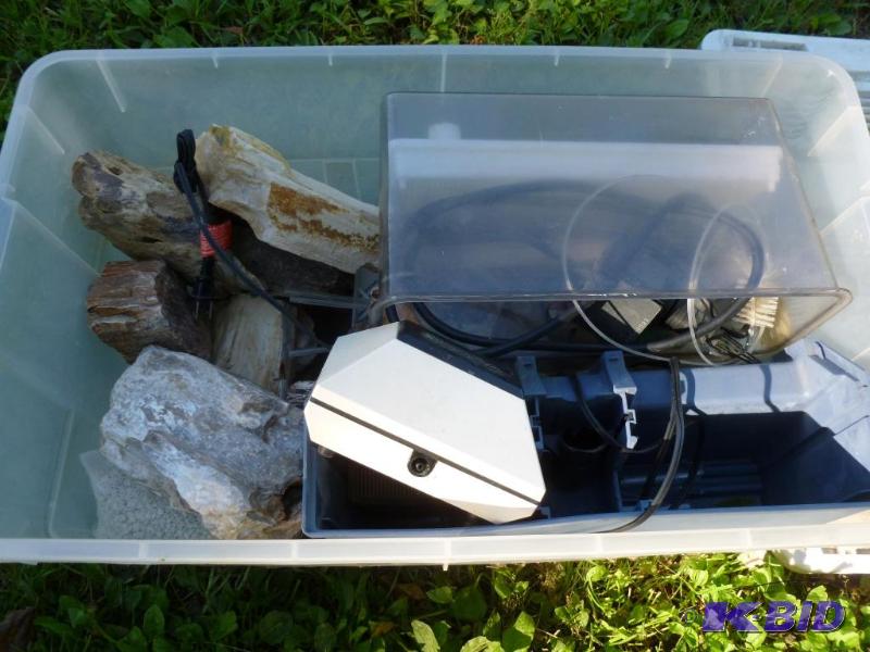 Large plastic tote filled with aquarium items...