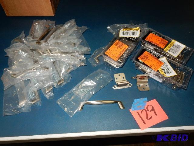 29, Drawer pulls as shown.. 3 boxes of Hinges...