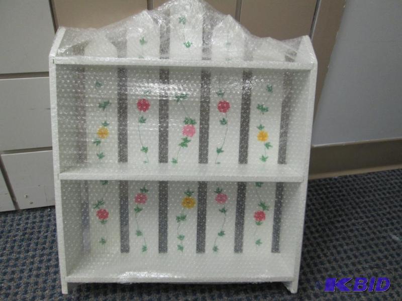 lot 209 image: A Shelf that looks like a picket fence with f...