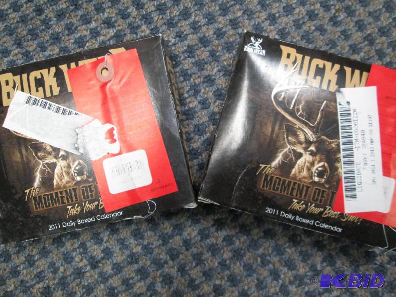 lot 230 image: Qty 2 Buck wear calendar expired...