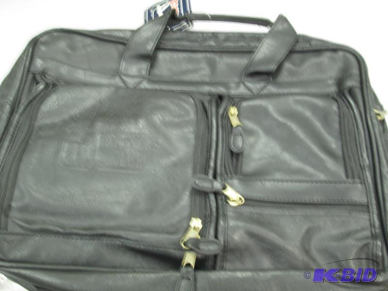 lot 34 image: PGA Tour Black  Mercury Luggage...