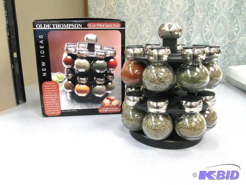 lot 69 image: Olde Thompson 16 Jar Filled Spice rack...