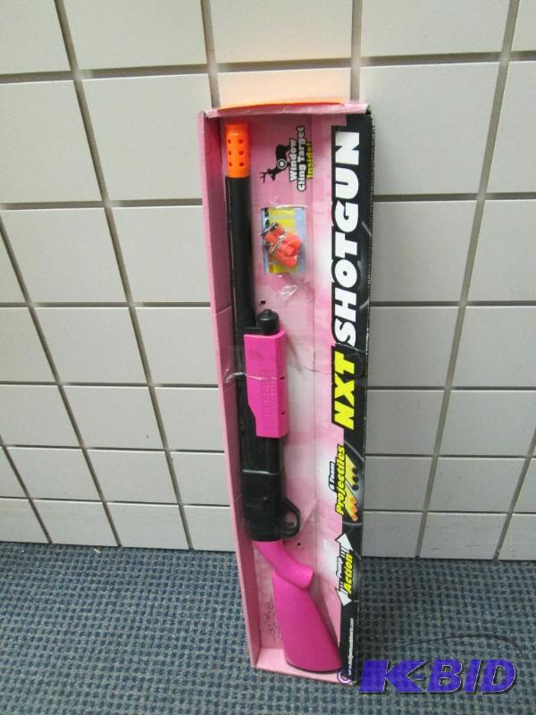lot 83 image: NXT shot gun (girls it is pink) 6 foam Projec...