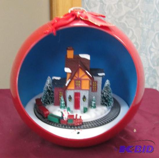 Look like a Christmas bulb with a house and t...