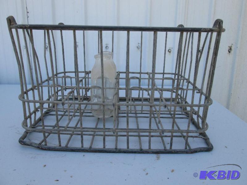 lot 11 image: vintage ,stackable,metal milk crate with 2 gl...