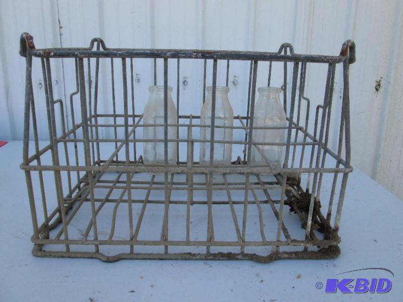 lot 12 image: vintage ,stackable, metal milk crate with 3 g...