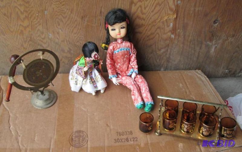 lot 134 image: 2 oriental dolls, a gong and 8 little glasses...