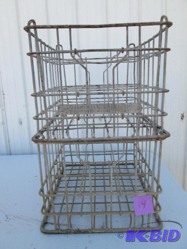 lot 14 image: 2 vintage ,stackable, metal milk crates with ...