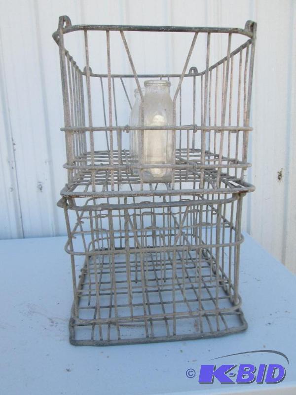 lot 19 image: 2 vintage ,stackable, metal milk crates with ...