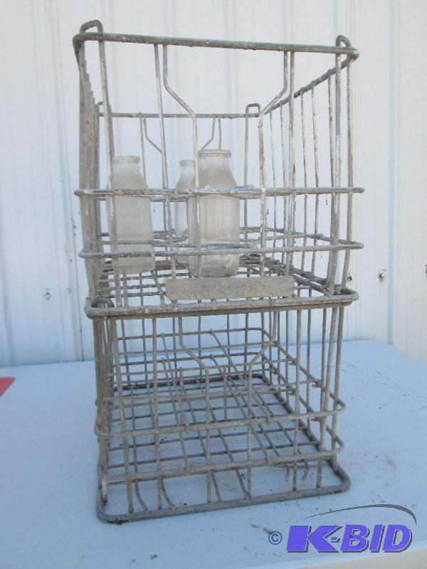 lot 22 image: 2 vintage ,stackable, metal milk crates with ...