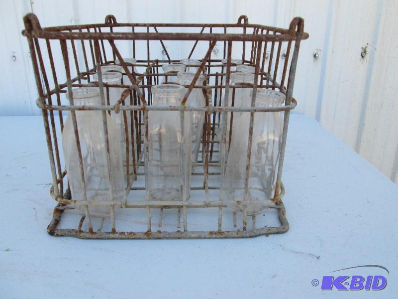 lot 27 image: vintage ,stackable, metal milk crate with 12 ...