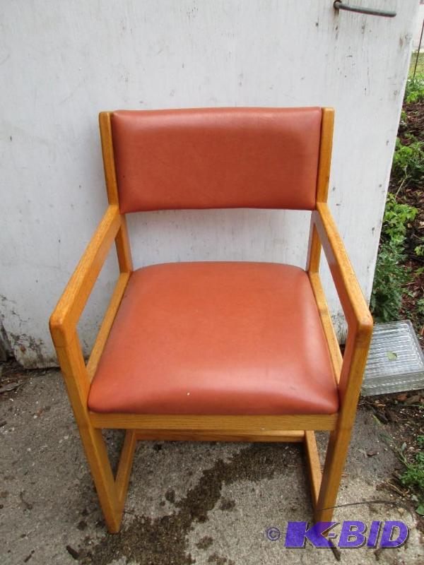 lot 285 image: wood reception chair with brown vinyl padding...