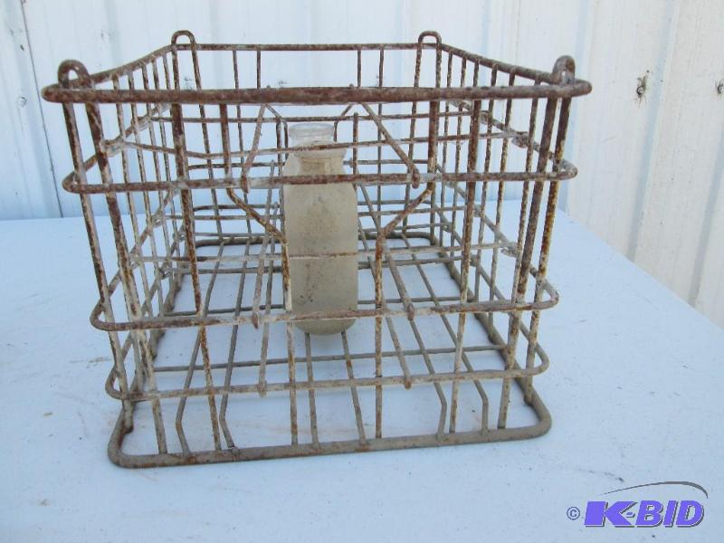lot 37 image: vintage ,stackable, metal milk crate with 2 g...