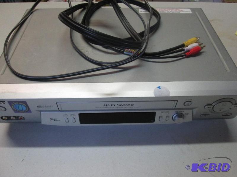 lot 46 image: Sony VCR with glow in dark remote, used...