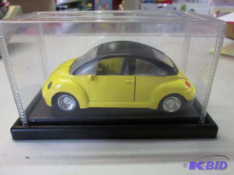 lot 49 image: Yellow toy VW, with box...
