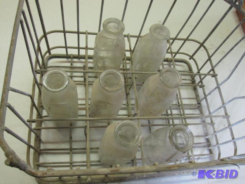 lot 53 image: vintage ,stackable, metal milk crate with 7 g...