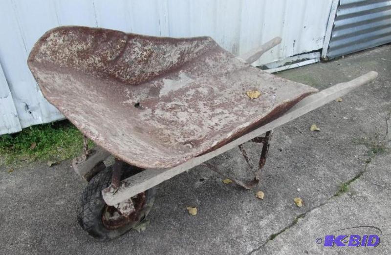 lot 65 image: vintage wheelbarrow, wooden handles...