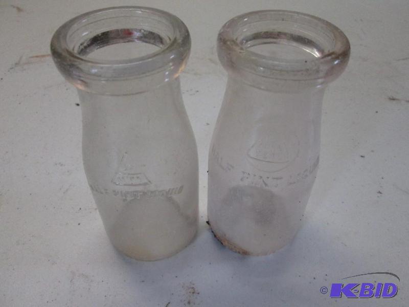 lot 70 image: vintage glass bottles, half pint, Minn. Seal...