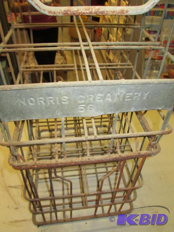 lot 72 image: (2) vintage ,stackable, metal milk crates wit...