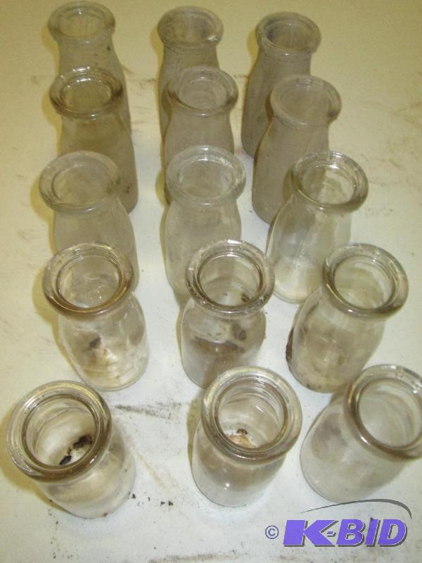 lot 73 image: (15) vintage glass milk bottles...
