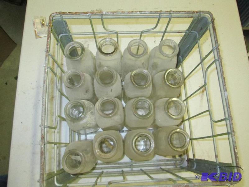 lot 76 image: Vintage , metal (yellow)milk crate with 16 gl...