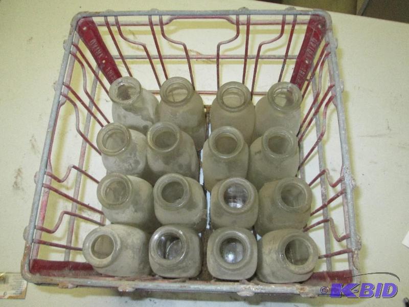 lot 77 image: vintage , metal (red)milk crate with 16 glass...