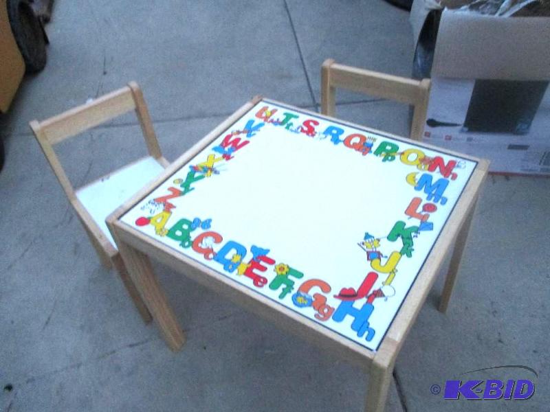 kids table and two matching chairs...